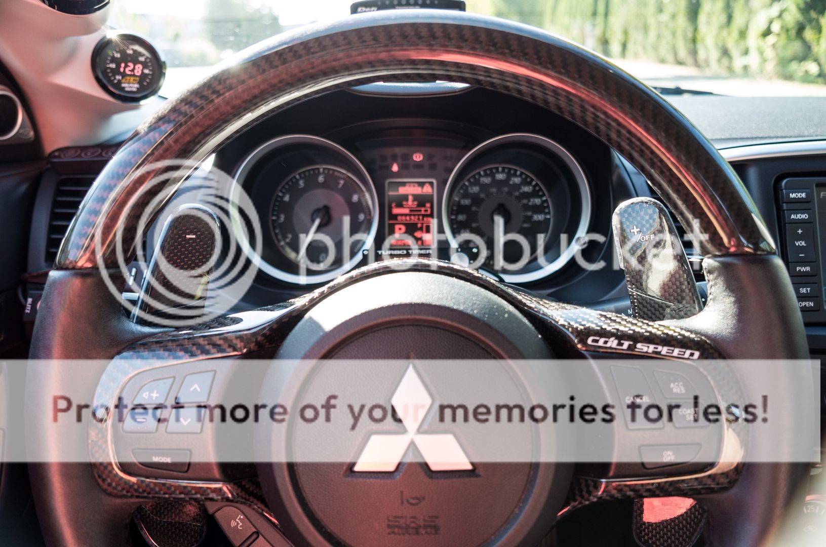 For sale only Evo X Carbon Fiber OEM steering wheel REVscene Automotive Forum